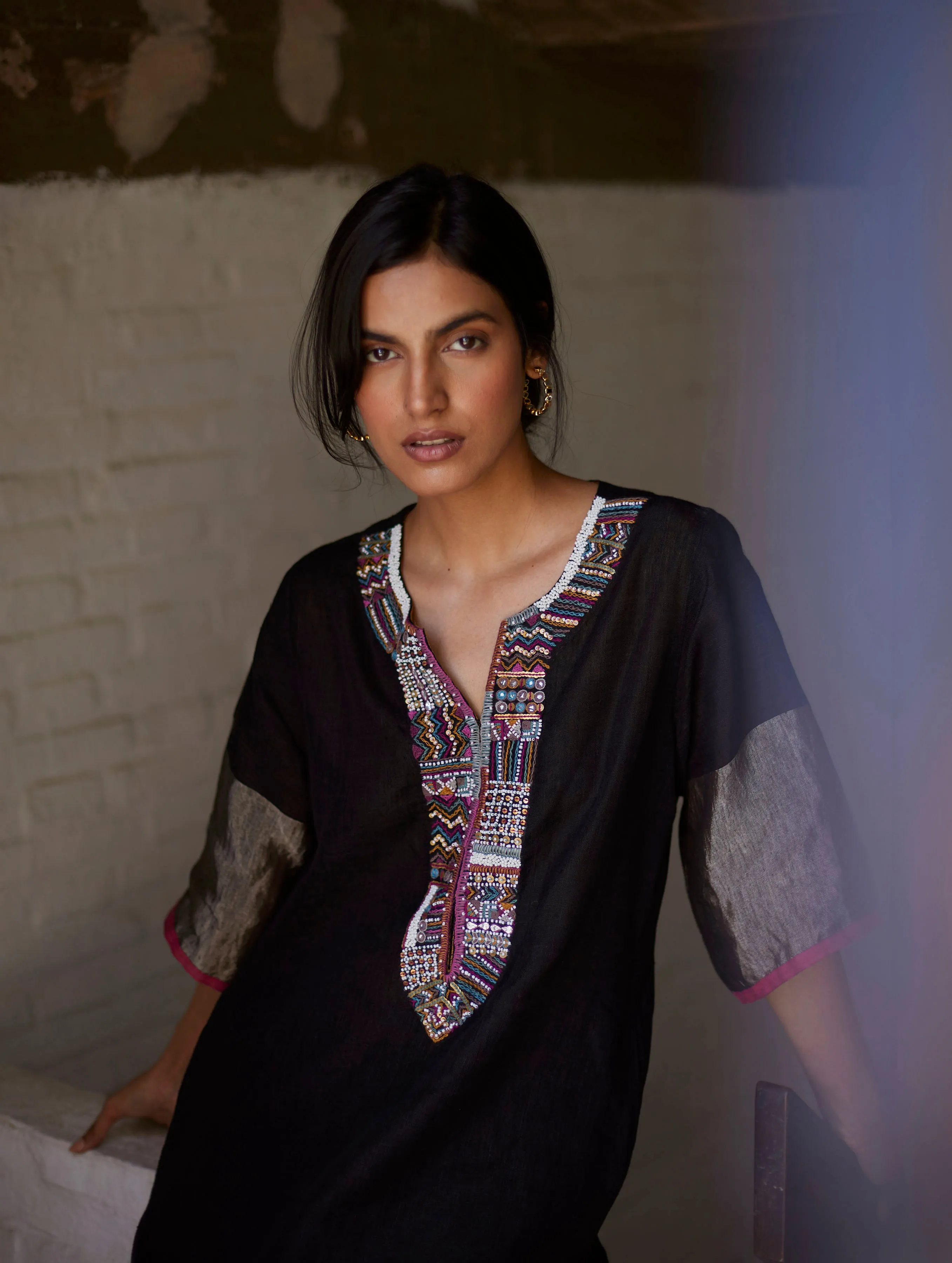 Sure! Here’s an optimized title for the e-commerce product:

Elegant Black Mato Hand-Embroidered Kurta Set for Women - Traditional Ethnic Wear