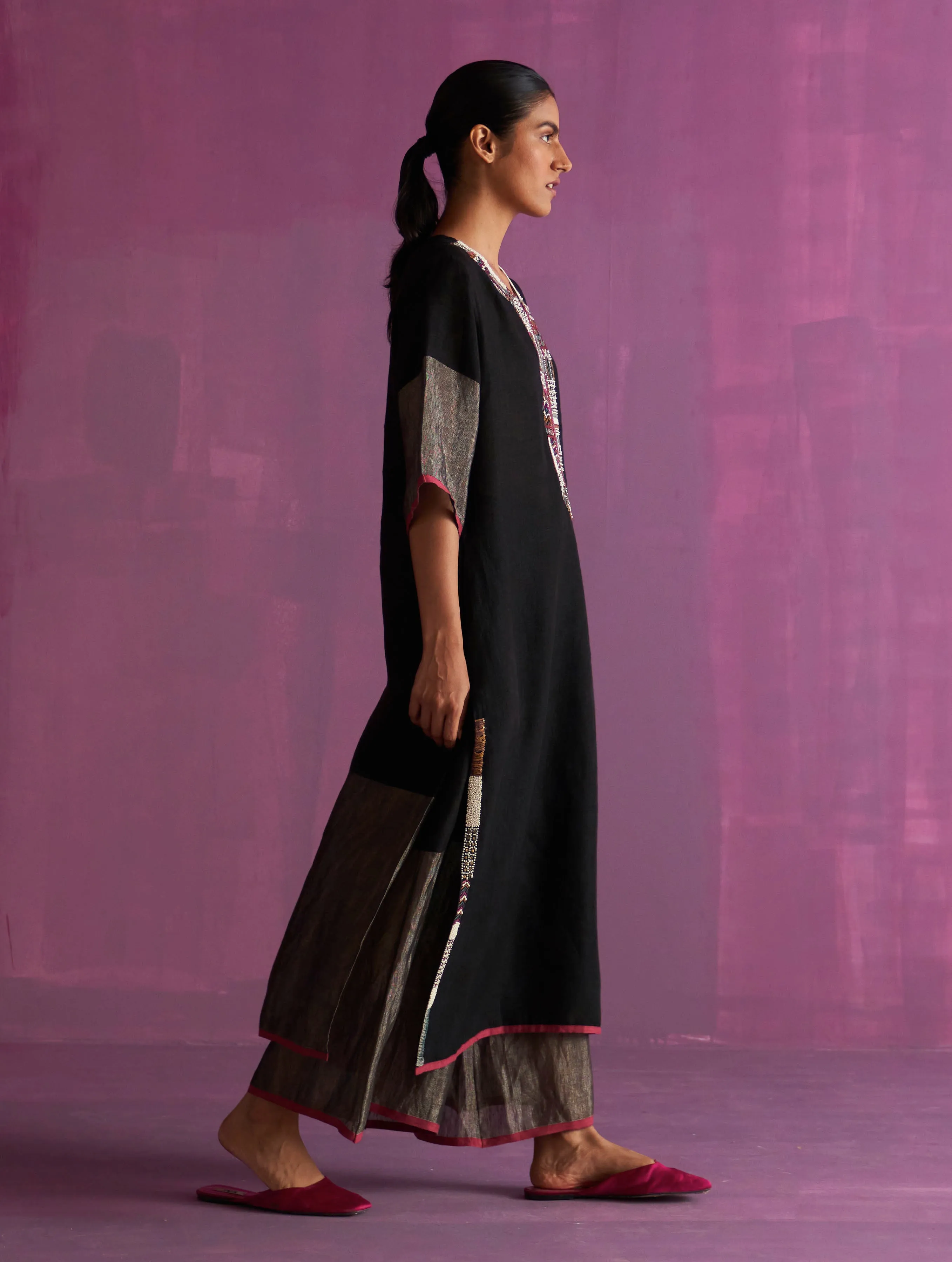 Sure! Here’s an optimized title for the e-commerce product:

Elegant Black Mato Hand-Embroidered Kurta Set for Women - Traditional Ethnic Wear