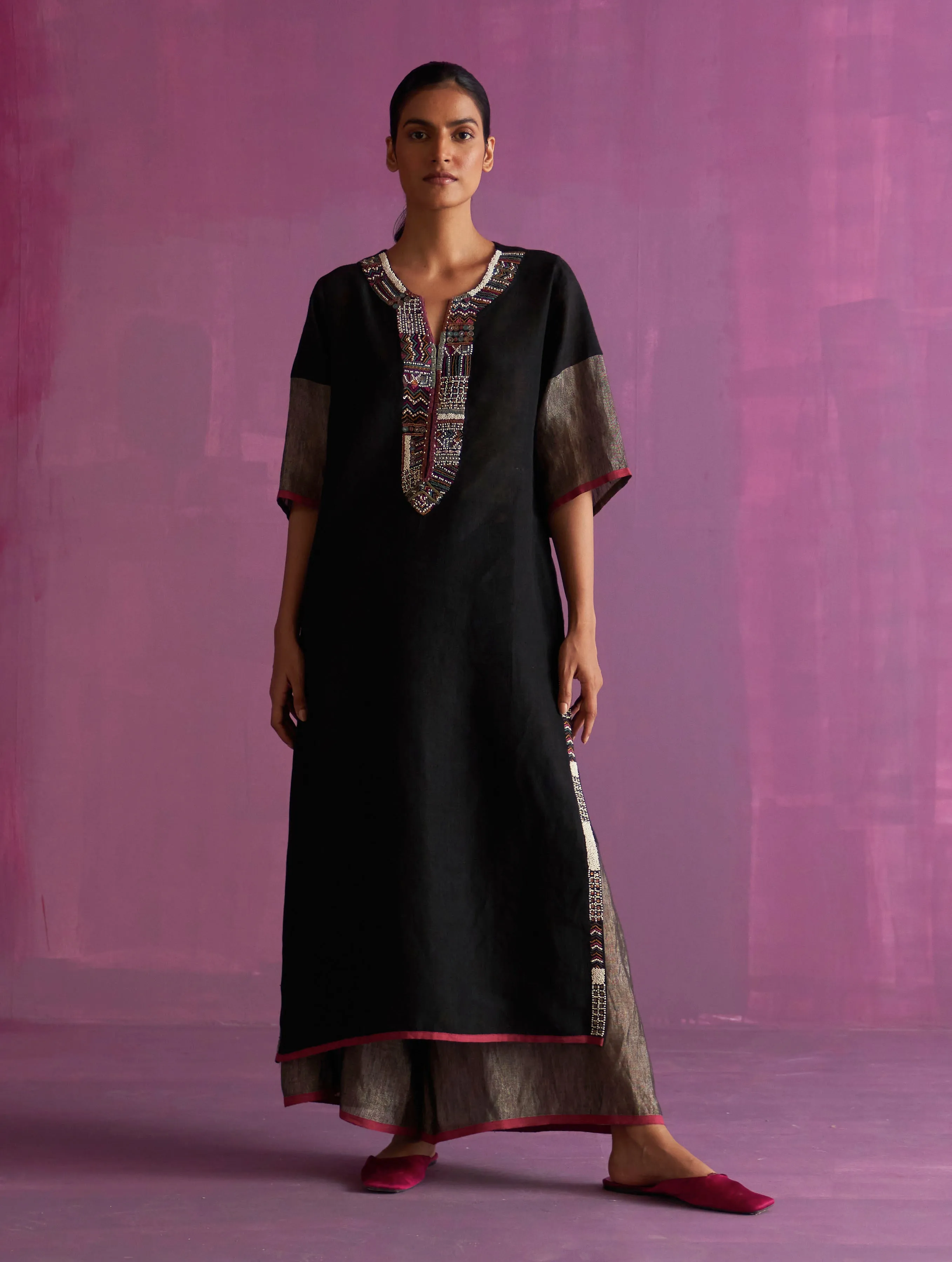 Sure! Here’s an optimized title for the e-commerce product:

Elegant Black Mato Hand-Embroidered Kurta Set for Women - Traditional Ethnic Wear