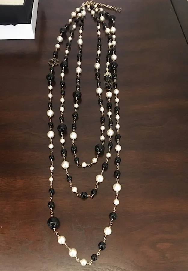 RARE Chanel 100th Anniversary 2010 Cruise 10C Black White Gold Pearl Coco Figure Sautoir 3 Strand Long Necklace